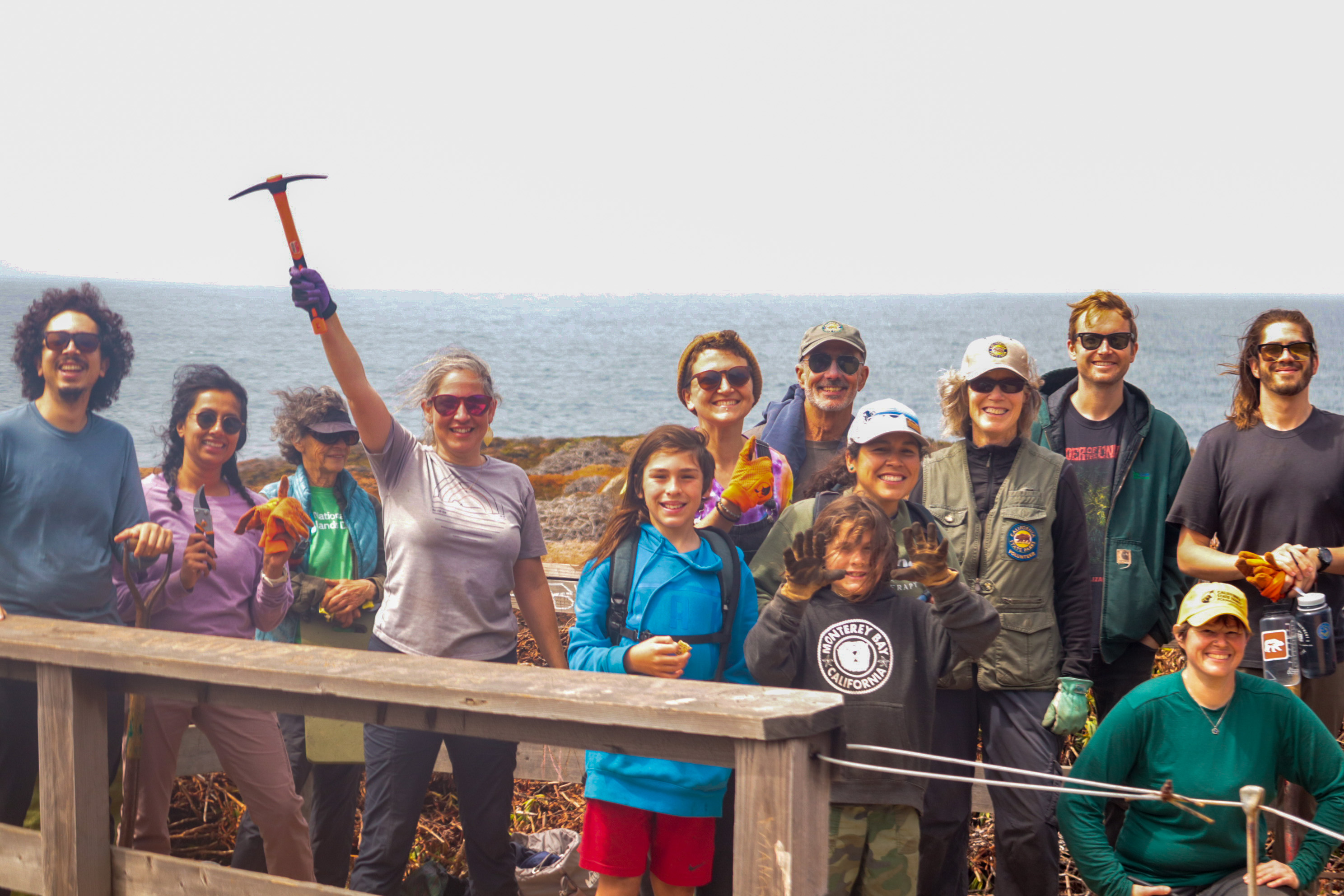 Volunteers pose after a morning of ice plant removal on the Garrapata State Park bluffs.