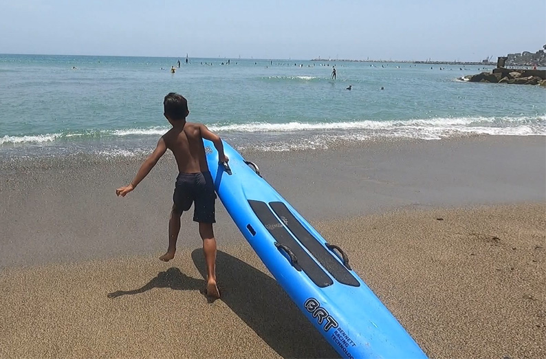 Jr. Lifeguards with a paddleboard