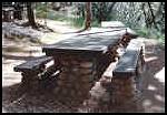 WPA built stone picnic table at Marshall Gold SHP