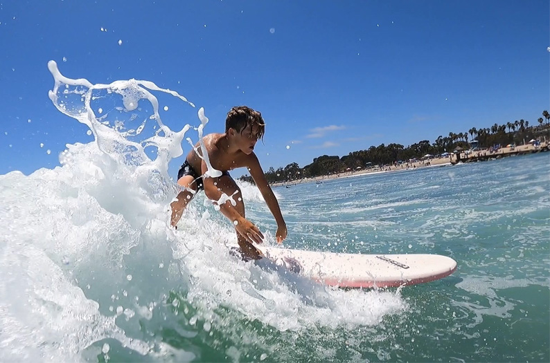 Jr. Lifeguard surfing
