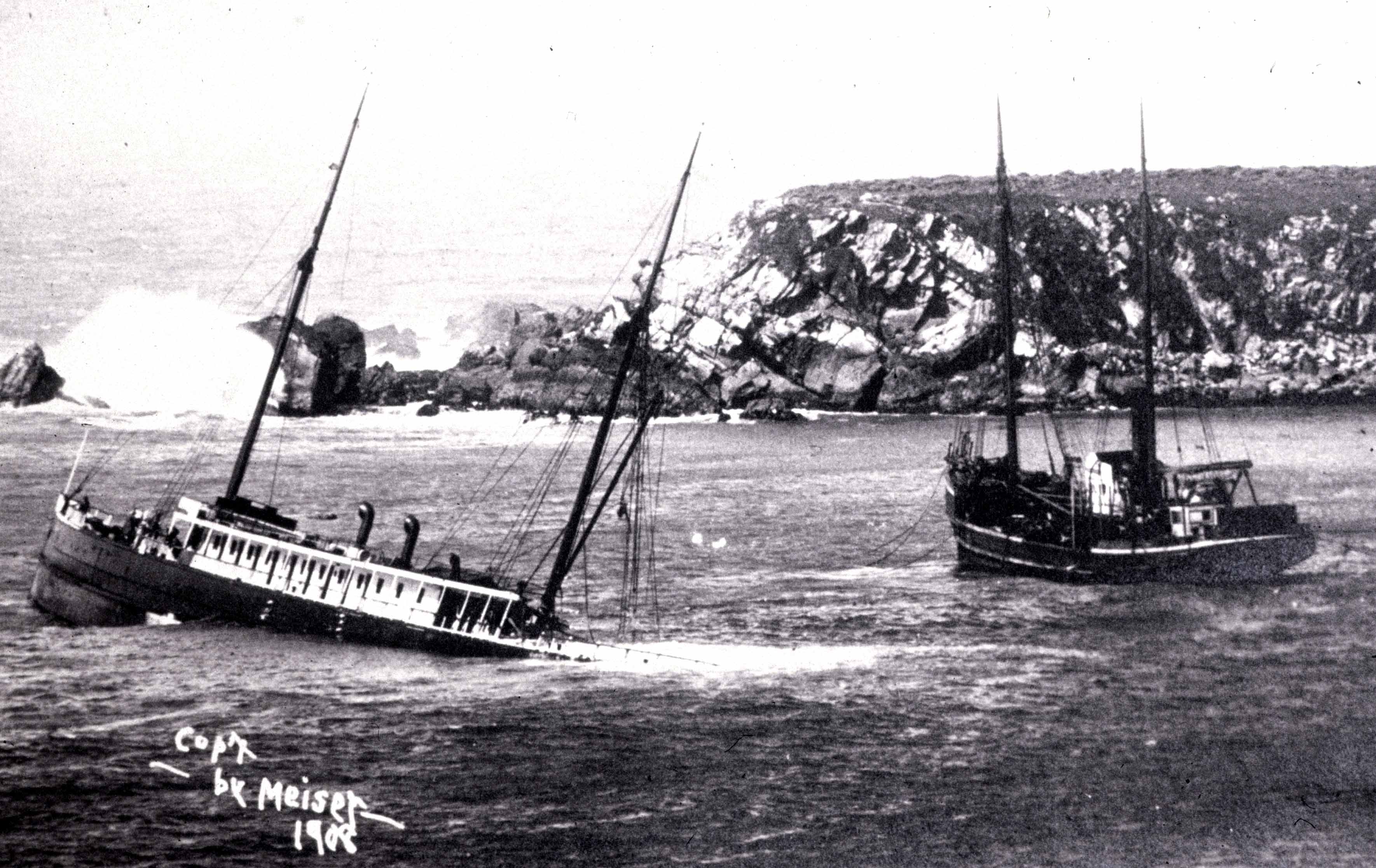 Historic photo of the SS Pomona wreck and the salvage vessel the Greenwood taken in 1908