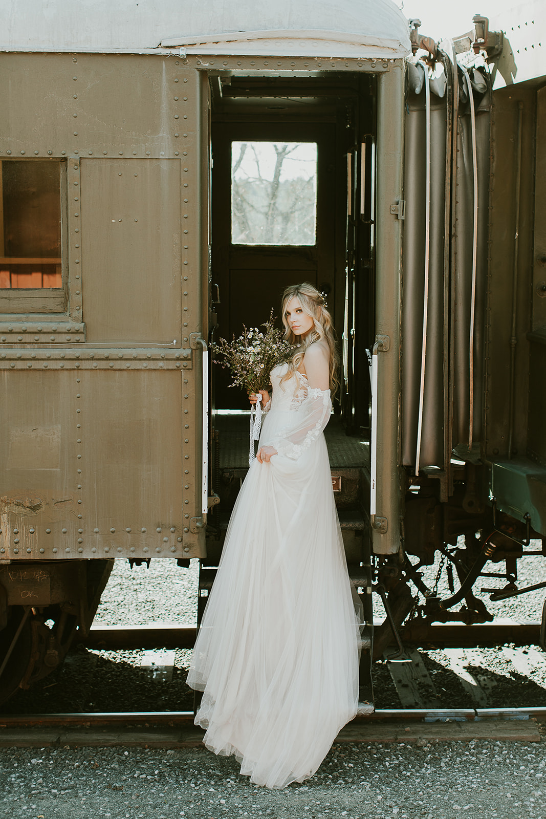 Wedding photo with historic railcar