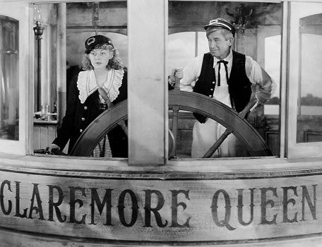 Will Rogers and Anne Shirley in "Steamboat 'Round The Bend"