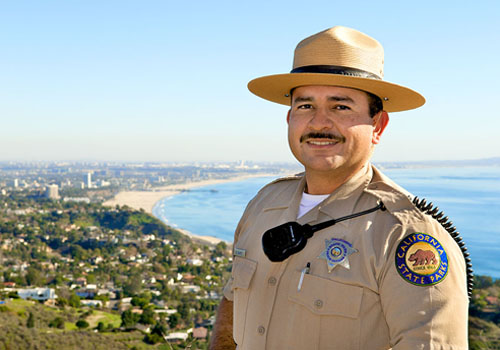 Ranger with the ocean as a background